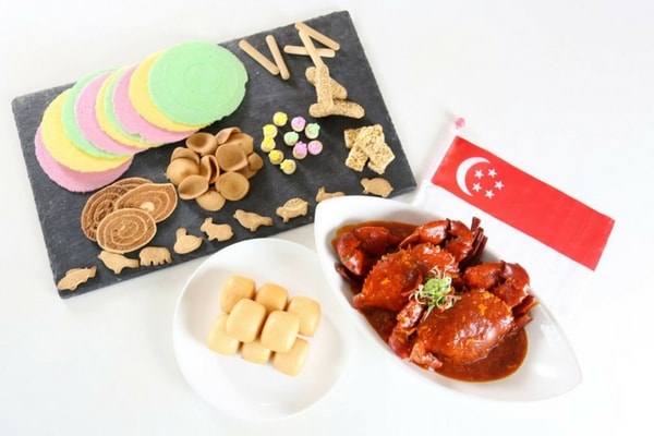 crab curry dish with singapore flag